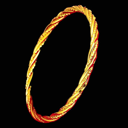 Gold-plated, intricately woven twisted rope pattern bangle bracelet; lightweight and hypoallergenic.