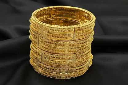 Aveline Charm Classic Minimal Gold-Plated Bracelet: stack of textured, hypoallergenic gold bangles.