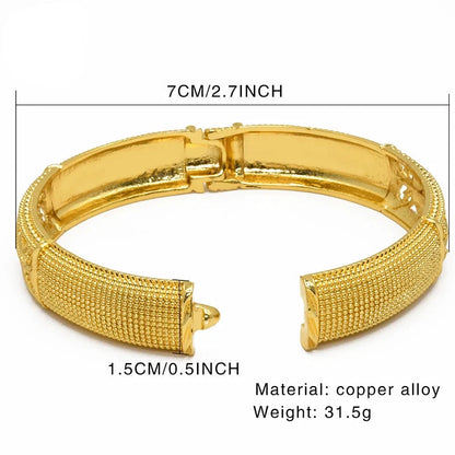 Gold bracelet with measurements and material details on a white background